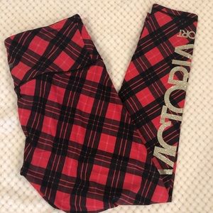 Victoria’s Secret medium leggings. Black and red plaid